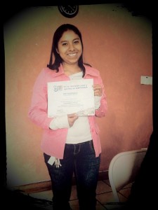 Lily with her certificate of completion for her leadership class